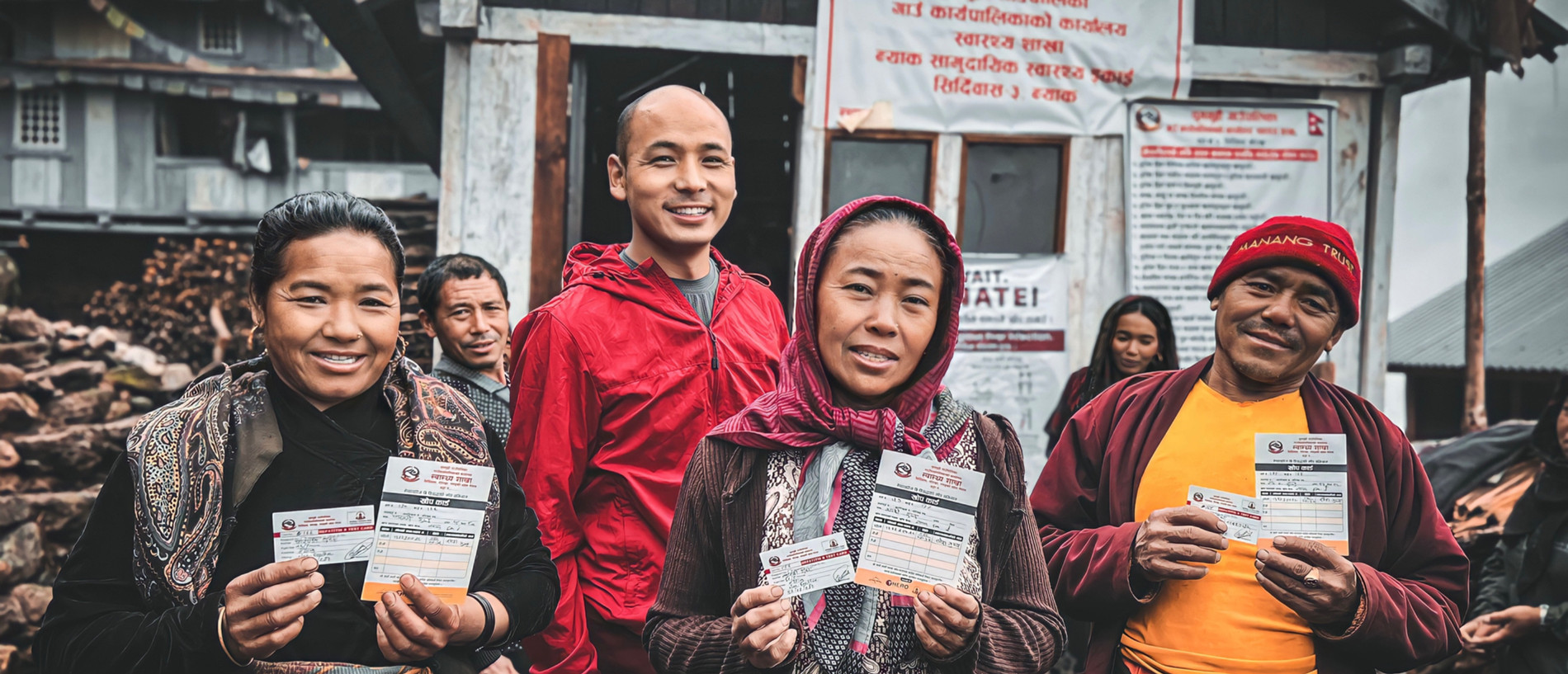 Wangchuk Rapten Lama with community members during a Hepatitis B screening and vaccination programme in Nyak village